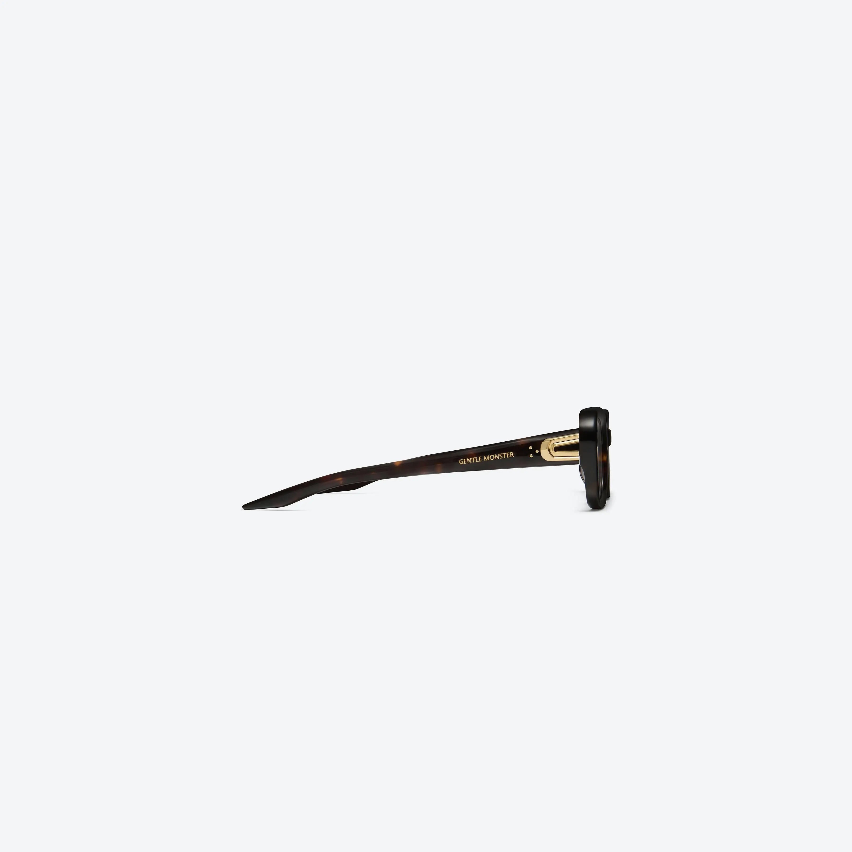 Lunettes de soleil femme Gentle Monster Melrose T1, monture écaille et charnière dorée.